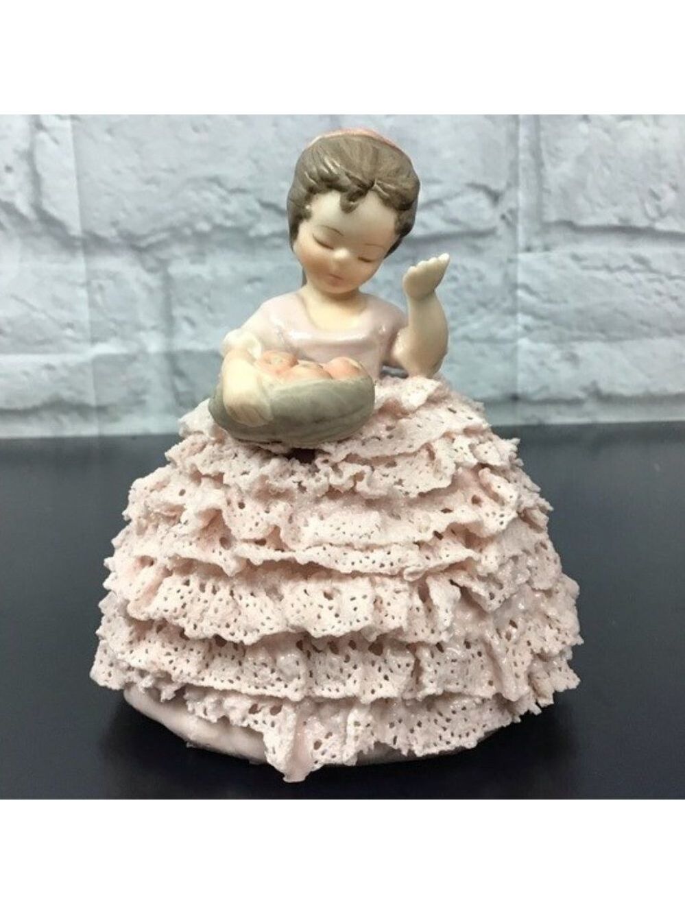 Vintage girl holding apples lace figurine
